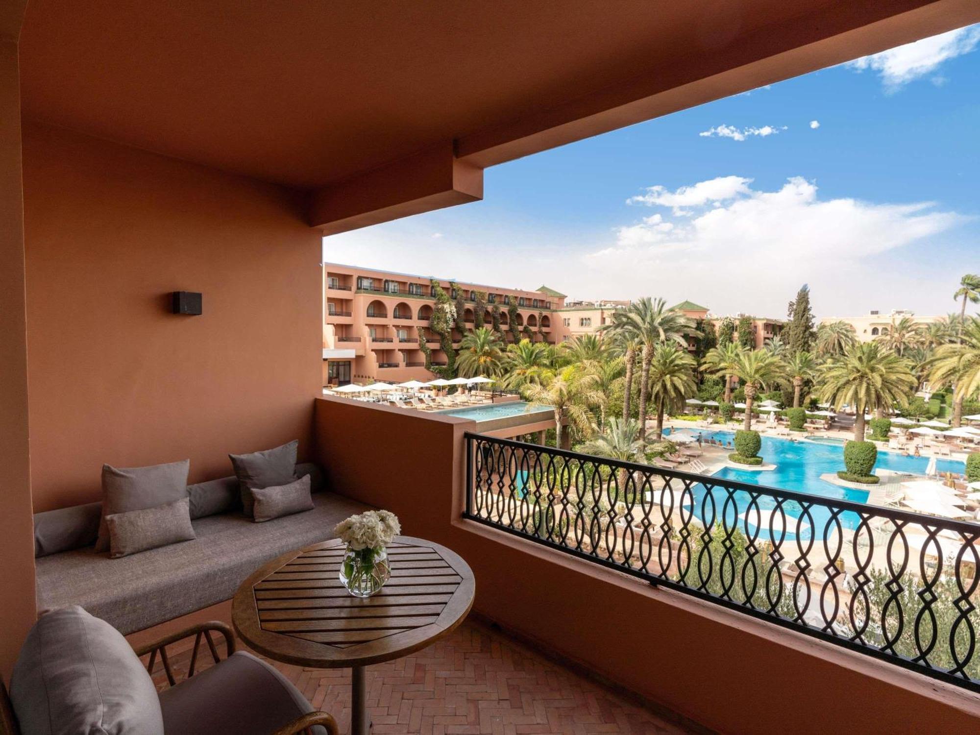 Contemporary Deluxe Room Balcony Pool View